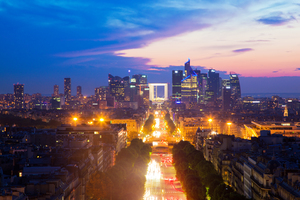 View on La Defense and Champs-Elysees at sunset in Paris France.