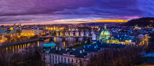 View at The Charles Bridge and Vltava river in Prague in dusk at sunset
