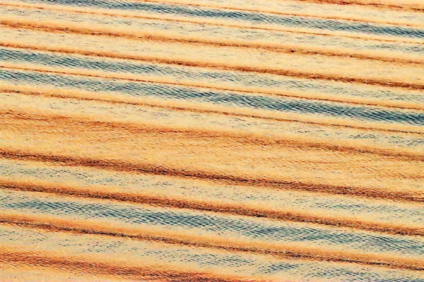 Brown And Blue Line Pattern In Water by Deb Oppermann