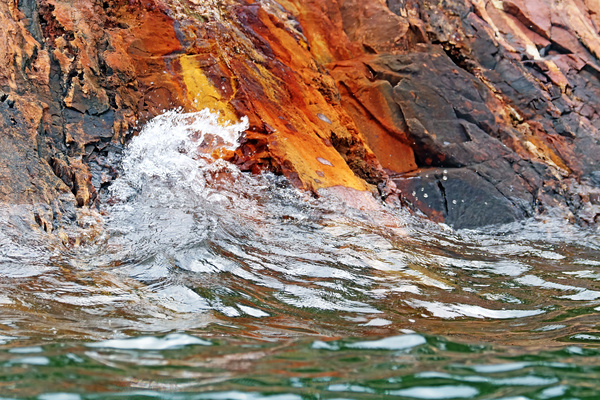 Splashing On Rock Print