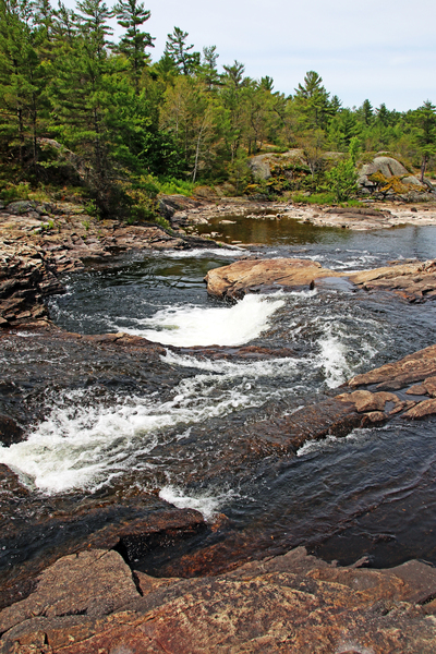 Wild And Remote Waterfalls by Deb Oppermann