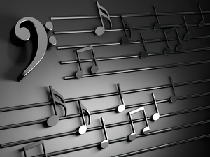 Musical design.Musical writing isolated over black