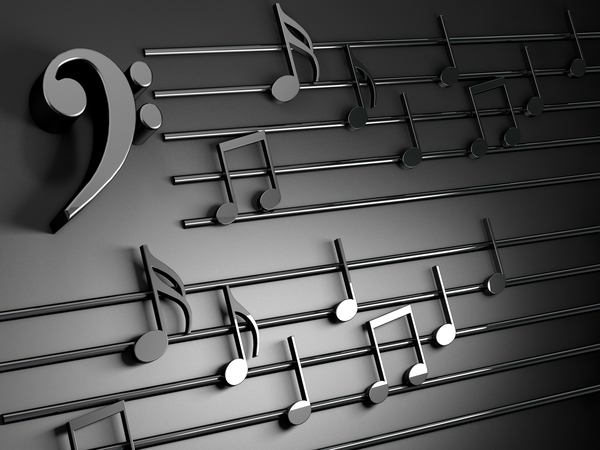Musical design.Musical writing isolated over black by Carlos Castilla