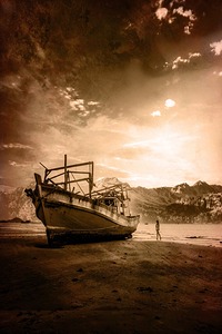 Old Ship on the seaside and woman