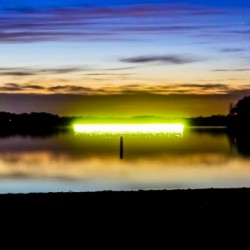 Jet Skier on a Lake at Dusk