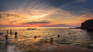 Holiday makers at Bude Seapool Summerleaze Beach  Bude Cornwa