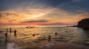 Holiday makers at Bude Seapool Summerleaze Beach  Bude Cornwa