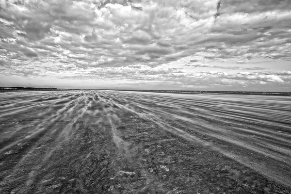 Blowing Sand On Beach by John Mehalik