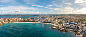 A Coruna city aerial perspective. Old historic center of the city.  Panoramic aerial view of all Region. Famous travel destination in Galicia northwest of Spain. Promenade and beach area of the city