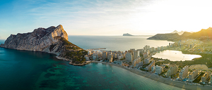 Aerial drone view of Calpe city. View of Ifach Mountain. 