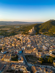 Aerial view of Biar city at sunset. Beautiful medieval city. Fortress on top of the hill. 