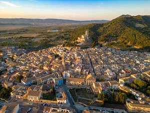 Aerial view of Biar city at sunset. Beautiful medieval city. Fortress on top of the hill. 