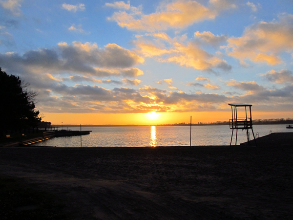 Lake Sunset On A Beach by Fotimenow