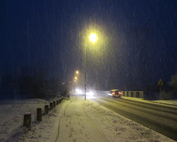 Night Snowfall With Lights And Cars by Fotimenow