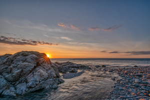 Rocks sun and water