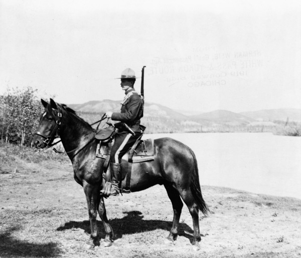 Royal Canadian Northwest Mounted Policemen On Horseback Dawson Yukon Territory Canada - circa 1917 by Canadian Retro