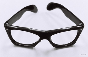 BUDDY HOLLYS GLASSES 