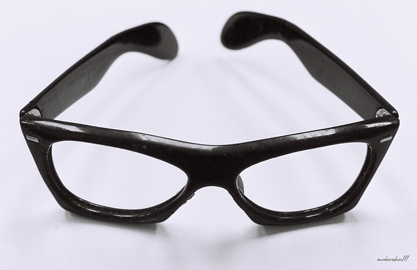 BUDDY HOLLYS GLASSES  by Bob Modersohn