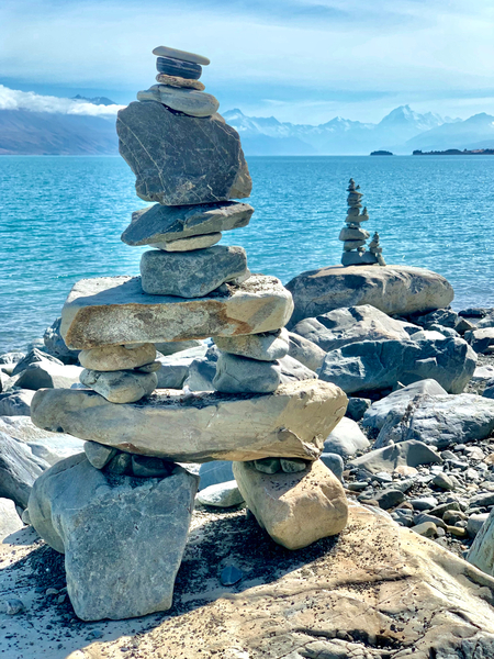 Inukshuk in Front of the Lake by Jimmy Roy Photos