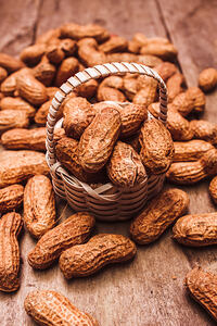 Peanuts in tiny basket in close-up