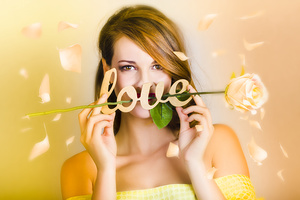 Young beautiful woman expressing feelings of love