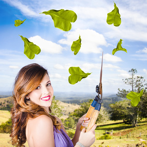 Elegant young woman with shears. Gardening love