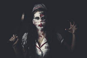 Possessed health practitioner with surgeon saw