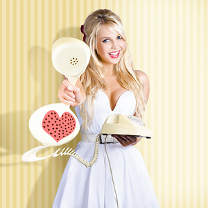 American Girl In Pinup Fashion With Retro Phone