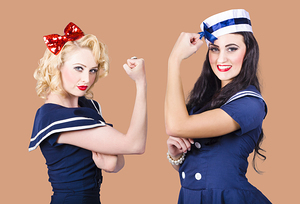 Pin-up sailor girls showing physical strength