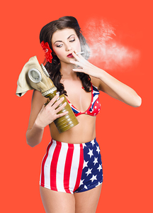 American military pin up girl holding gasmask 