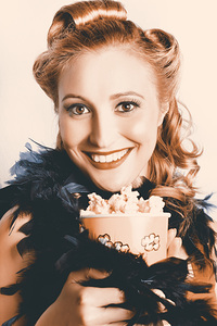Fifties Pinup Woman Seeing Movie At Retro Cinema