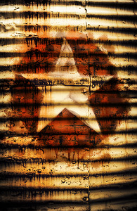 Rusty military star. Drums of war