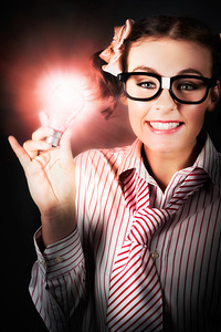 Smart Business Person Holding Light Bulb In Hand