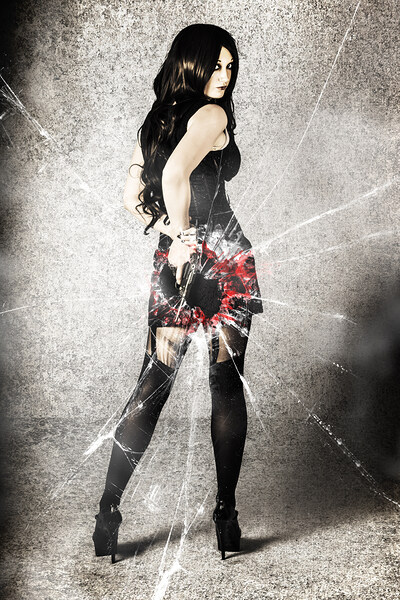 Sexy brunette woman holding gun with deadly style Print