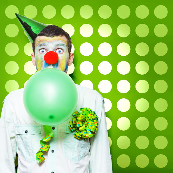 Crazy Party Clown Inflating Green Party Balloon by Jorgo