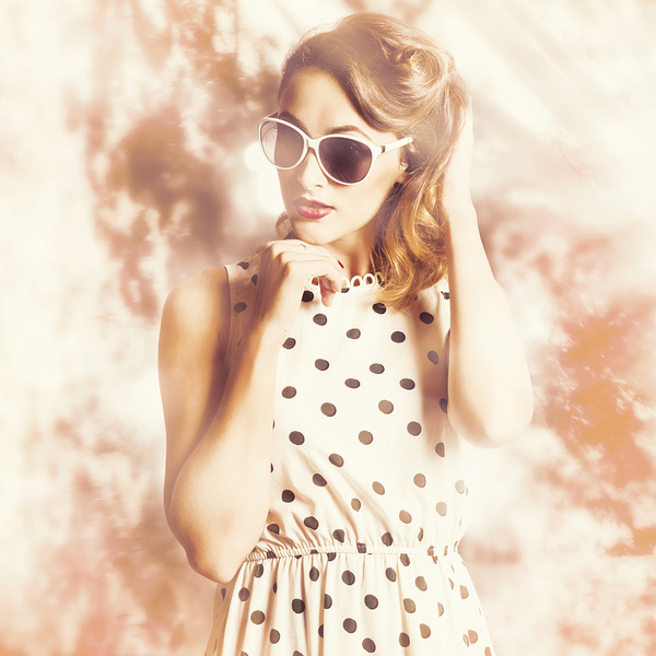 Pinup golden girl with perfect makeup and hair by Jorgo