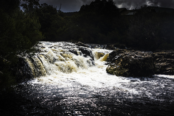 Splashing Australian water stream or waterfall by Jorgo