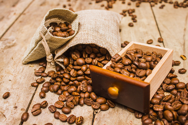 Burlap bag of coffee beans and drawer by Jorgo