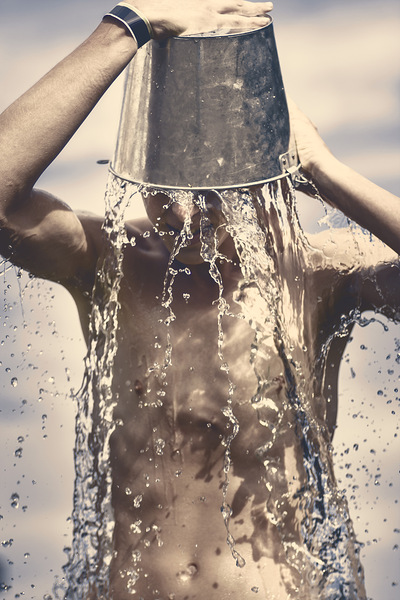 Young man having fun on a tropical summer holiday by Jorgo
