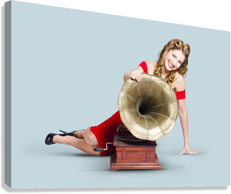 Beautiful pinup woman listening to old gramophone Canvas Print