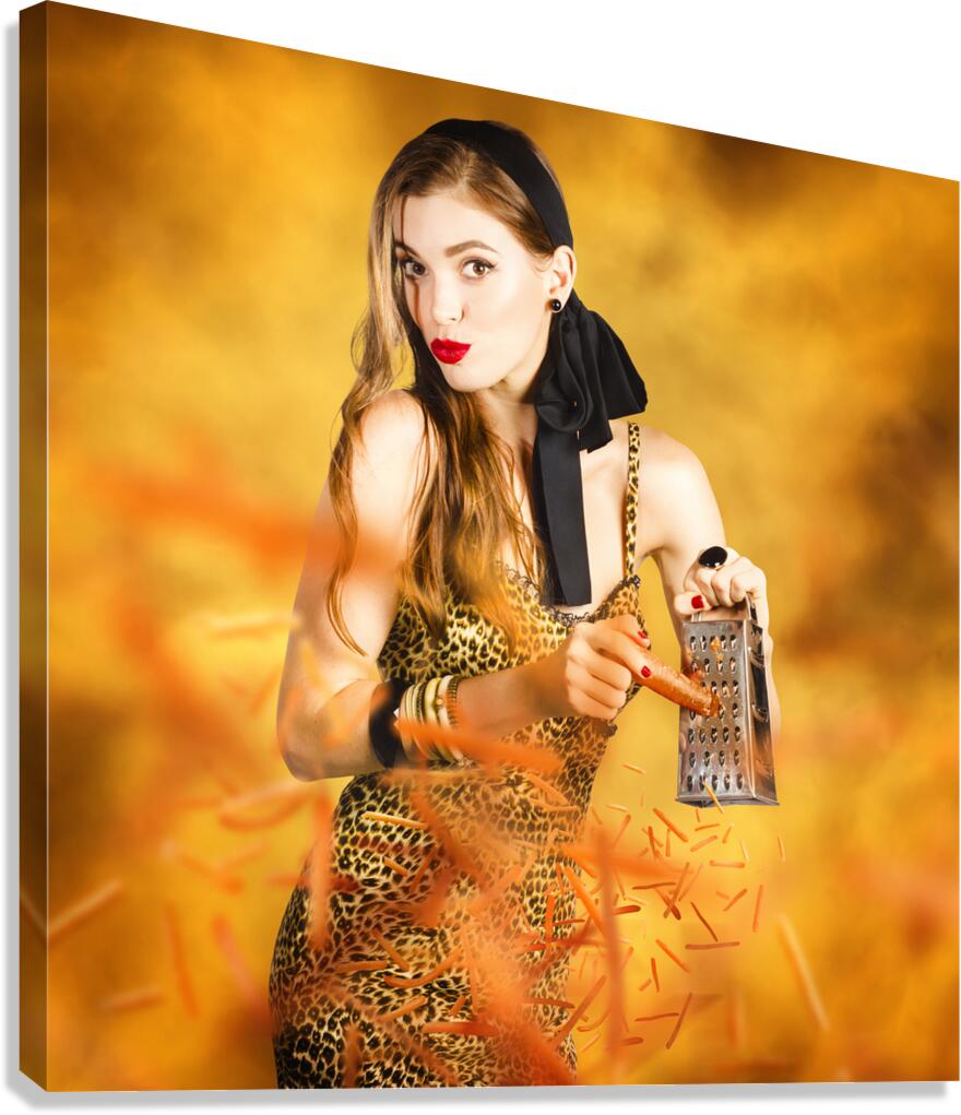 Housewife grating carrots Canvas Print