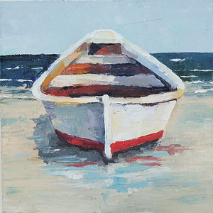 White and Red Rowboat on the Beach