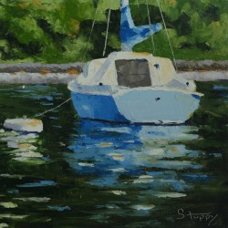 Small Blue Sailboat at Anchor
