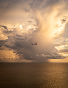 Fort Myers Beach Sunset w Coast Guard Helicopter 8-15-23