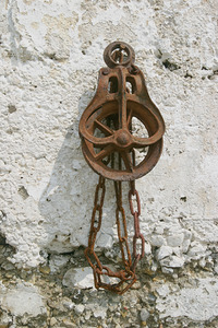 Rusty Old Pulley and Chain