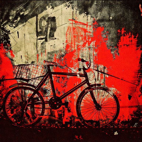Bike Against the Red Wall Print