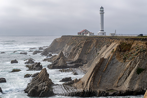 Point Arena Lighthouse with dramatic rocks