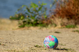 Lost play ball lying on beach