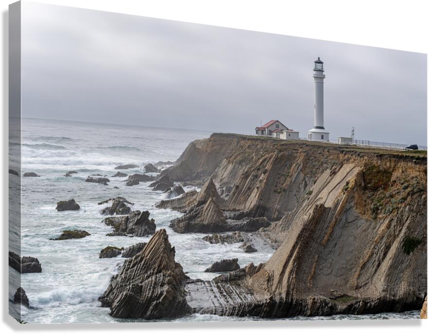Point Arena Lighthouse with dramatic rocks Canvas Print