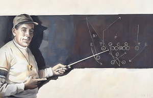 Football Coach at Chalkboard